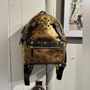 AUTHENTIC LIMITED EDITION MCM Gold bronze and Black Studded Backpack large size